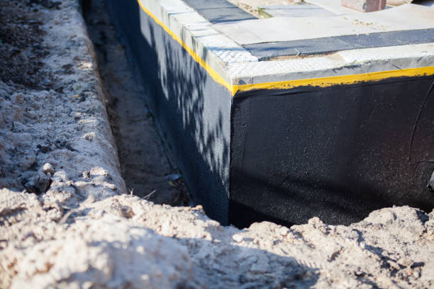 Professional Wet Basement Repair technician working in Farmingdale, NY
